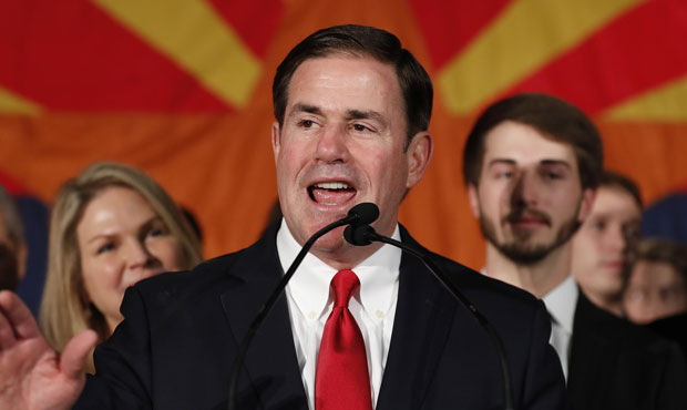 Ducey makes last business trip as governor